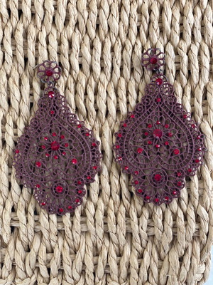 Long burgundy earrings used with color wear