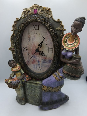 Table clock with African figures decoration, like new