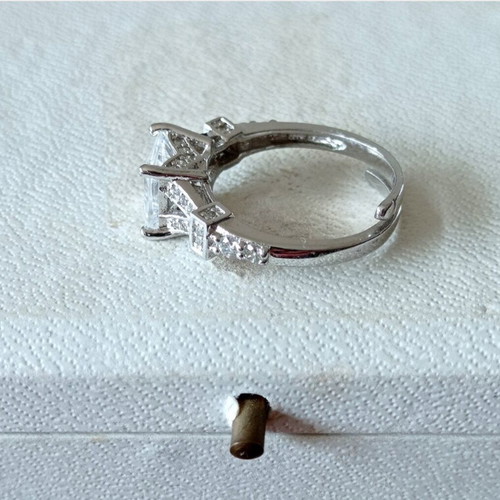 Galerie Tsangarakis rings with white sapphires like new, plated silver