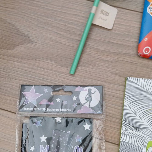 Painting set and school supplies new, one page missing