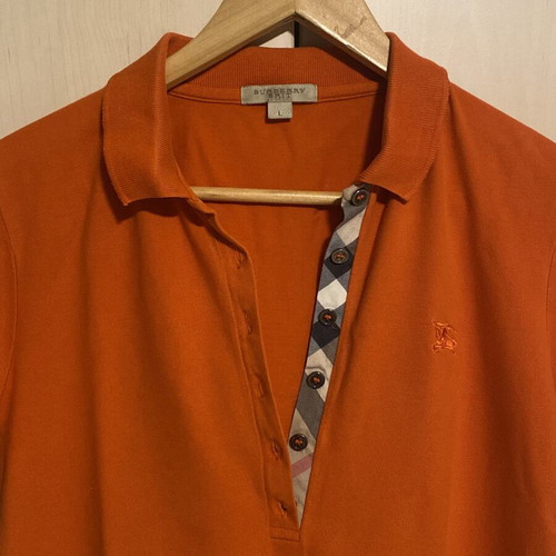 Burberry women's orange pique shirt like new