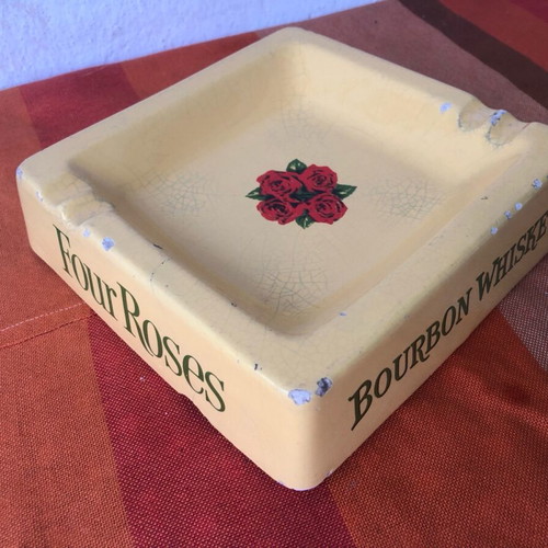 Four Roses porcelain ashtray used with cracks and chips