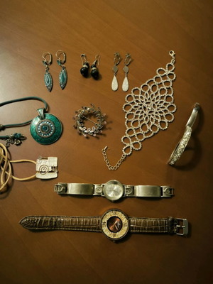 Jewelry set used with earrings, bracelets, pendants, brooch, and watches