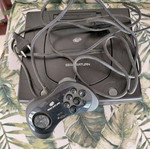 Sega Saturn console used with controller