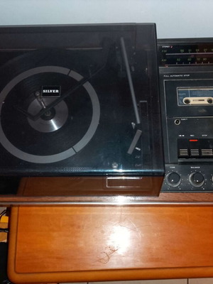 Silver turntable and tape recorder used, 1970-80