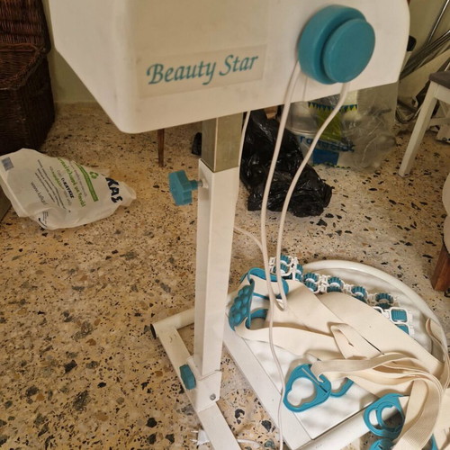 Massage and passive exercise device with rollers and straps like new