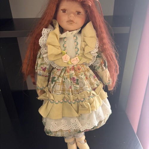 Porcelain doll like new with ginger hair
