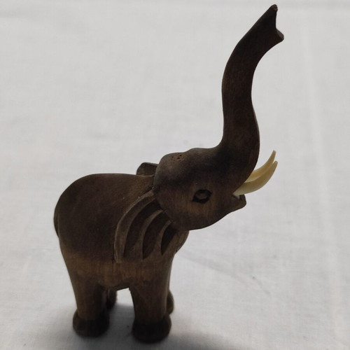 Vintage wooden elephant used with ivory tusks