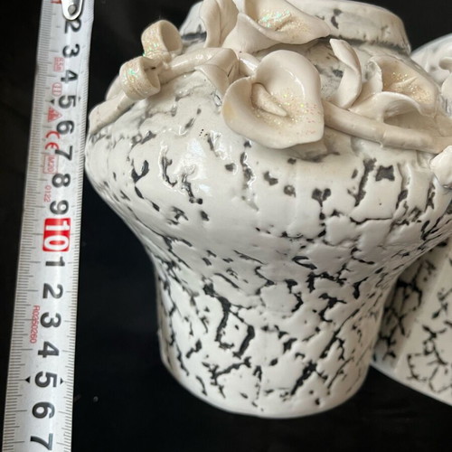 Ceramic vase new with embossed flower and curved detailed design
