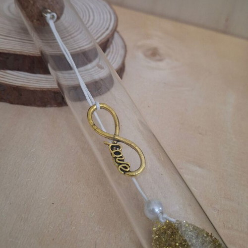 Glass test tube with infinite love decoration