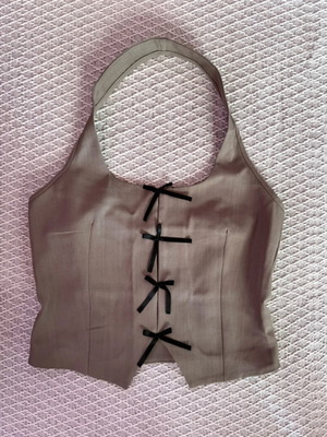 Elegant top with black bows, grey, size S