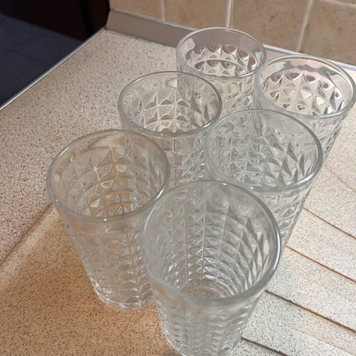 Water glasses set of 5 like new with embossed design