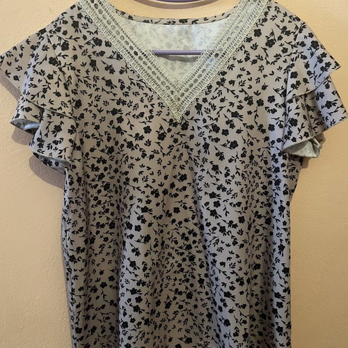 Women's blouse medium/large, beige with black floral pattern