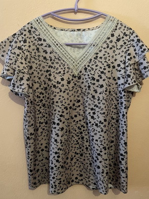 Women's blouse medium/large, beige with black floral pattern