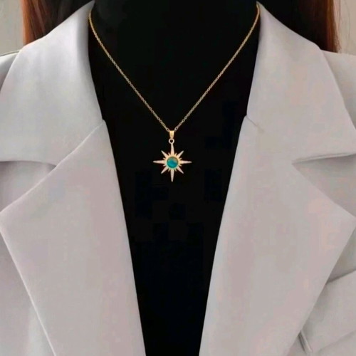 Steel necklace new with blue stone and gold details