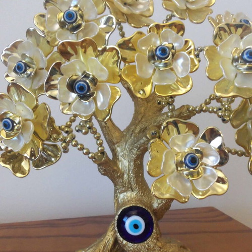 Decorative tree with blue eyes like new, height 27 cm