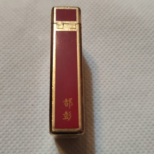 S.T.Dupont lighter like new, gold and red, refillable gas