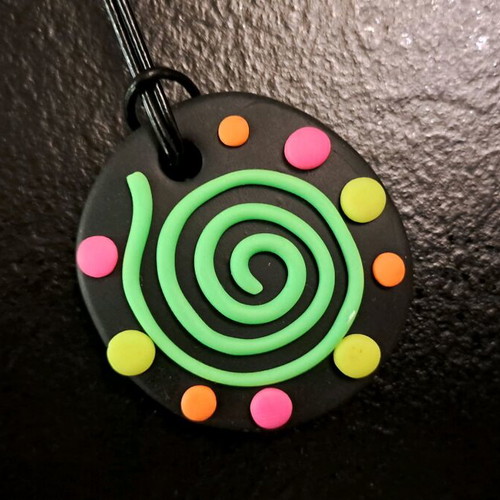 Handmade fluo pendant with spiral design like new