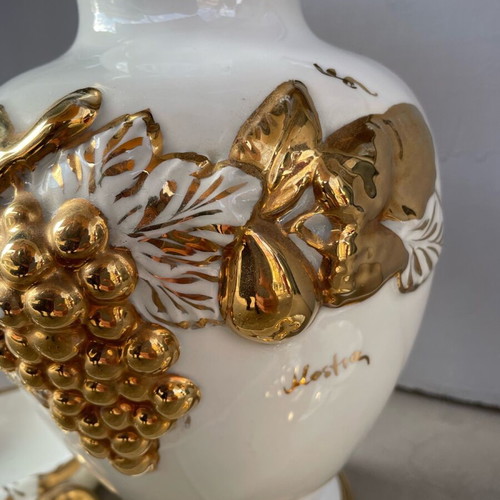 Porcelain vase gilded like new with grape designs and two ashtrays