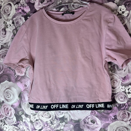 Pink short-sleeve crop top with black elastic band, size M