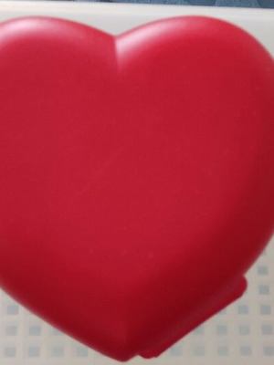 Tupperware heart-shaped food container like new
