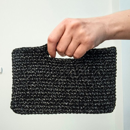 Evening bag handmade knitted with shiny yarn, black
