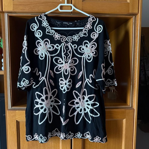 Black blouse with knitted designs new, size XXL