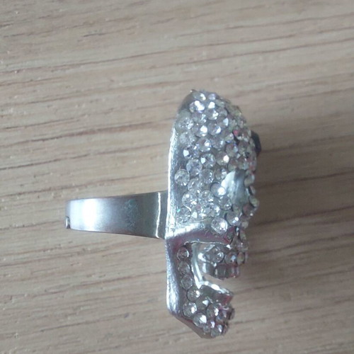 Skull ring like new with black and clear crystals, adjustable