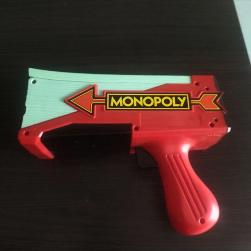 Monopoly Money Gun board game like new