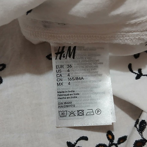 H&M Divided white dress with lace and black embroidery size Small like new