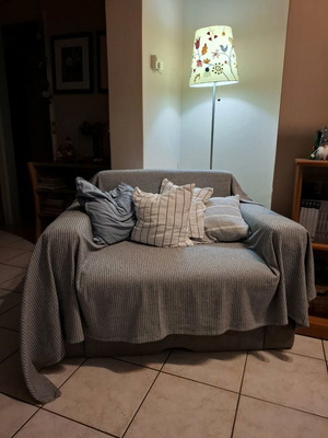 Armchair gray that converts to single bed like new