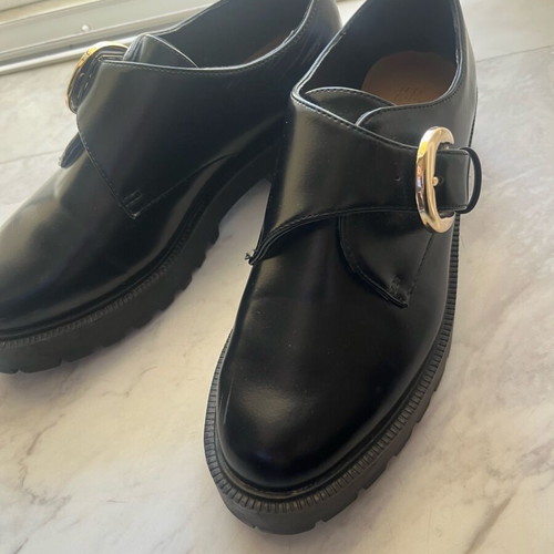 Women’s black H&M mules with high sole and gold buckle, like new, size 37