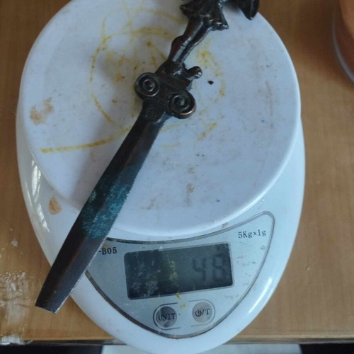 Copper paper cutter with tsolias figure used, broken tip
