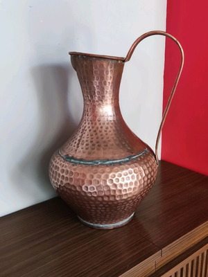 Large very old copper jug used
