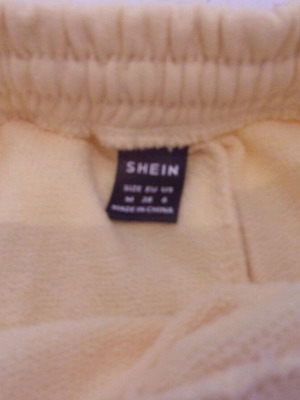 Shein women's yellow shorts medium used