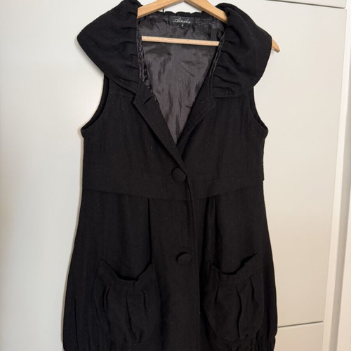 Black Sleeveless Coat size M used with minor wear