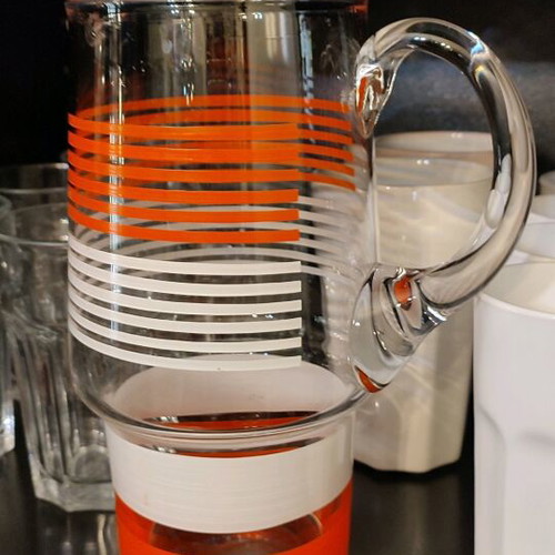 Glass vintage pitcher like new, orange-white