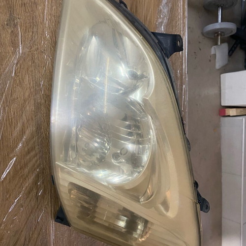 Toyota Corolla 03 driver headlight used