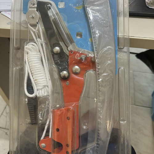 Pole pruner with pulley system and saw attachment