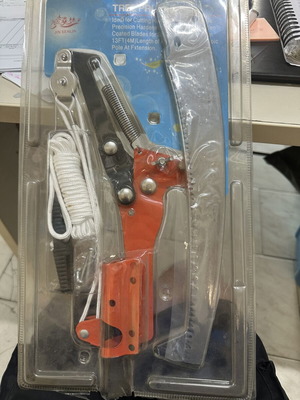 Pole pruner with pulley system and saw attachment