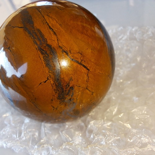Tiger's Eye new, diameter 50.3 mm, weight 201.73 g