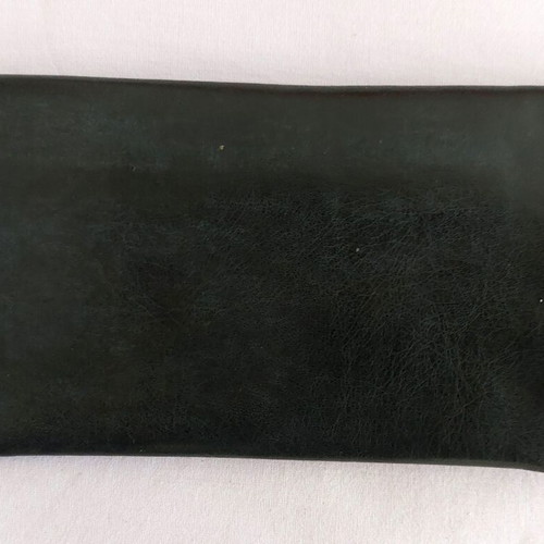 Black leather tobacco pouch used with paper holder