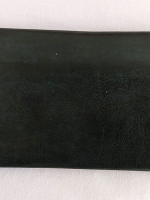 Black leather tobacco pouch used with paper holder