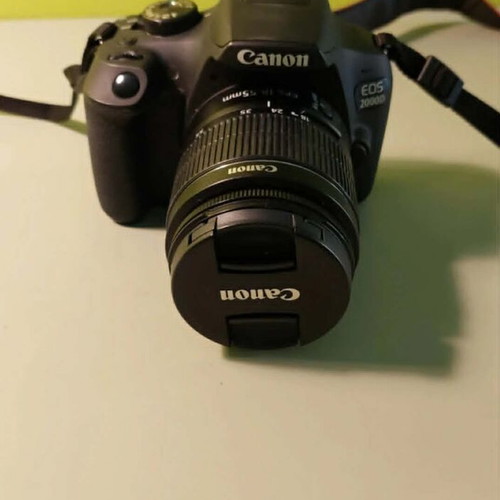 Canon EOS 2000D camera with 18-55mm lens like new and carrying bag