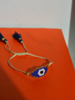 Handmade bead eye bracelet like new, blue and beige