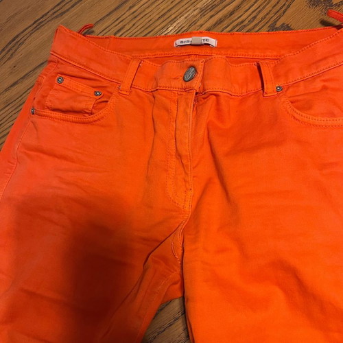 Orange pants like new made of Italian fabric