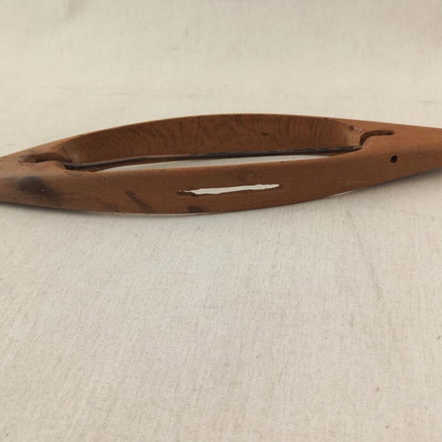 Wooden weaving shuttle used in good condition