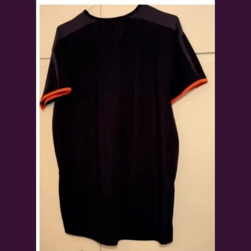 Umbro men's short-sleeve sports shirt used, black and orange, size L