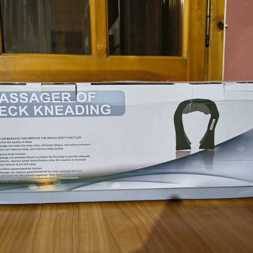 Neck massage device new in excellent condition