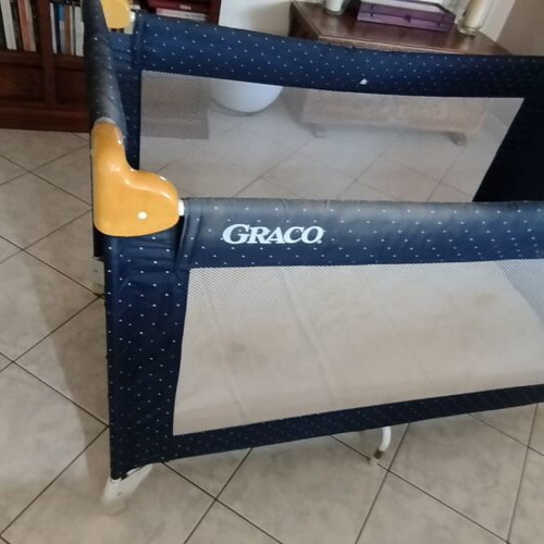 Baby playpen used with handle, dimensions 1.25x0.65x0.84 m